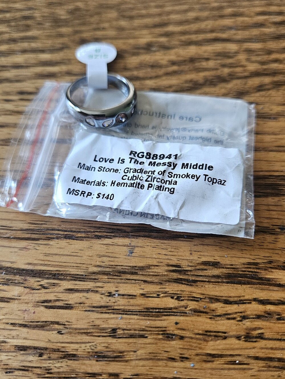 Bomb Party "Love Is The Messy Middle" Smoky Topaz Hematite Plated Ring Size 8.